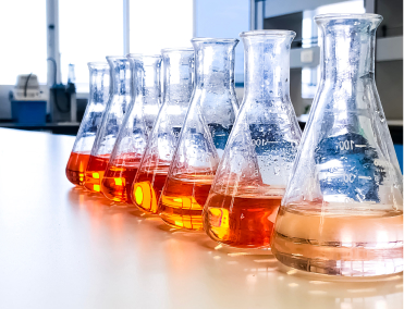 miscellaneous liquid chemicals in scientific containers