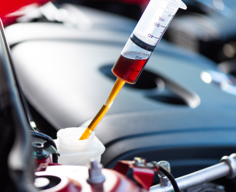 automotive liquid chemical in syringe